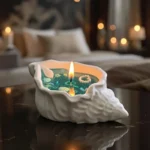 A lit seashell-shaped scented candle with shimmering turquoise wax, adorned with tiny seashells, pearls, and delicate flowers, glowing warmly on a cozy home table, evoking a fresh ocean breeze ambiance.