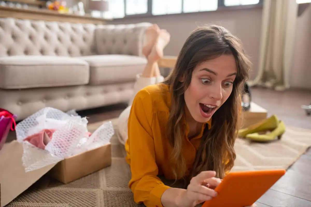 A smartphone user reacting to an unusual product on screen, demonstrating how novelty products spark curiosity and engagement.