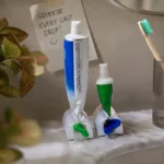 Rolling tube toothpaste squeezer stand for bathroom toothpaste holder accessory